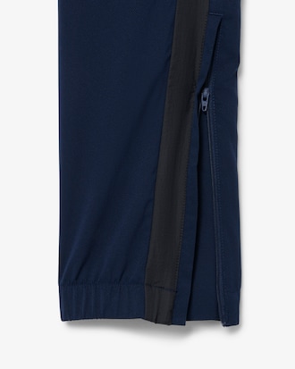 Conjunto de ch&aacute;ndal tenis repelente al agua