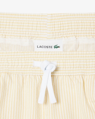 Traje de ba&ntilde;o con textura a rayas de longitud media para hombre