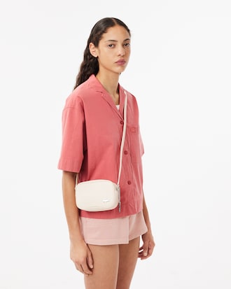 Petit sac à main en toile enduite à effet piqué 