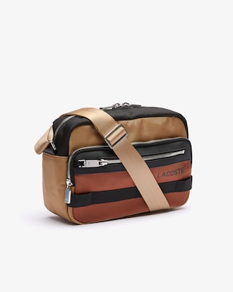 Sacoche L on the Go multipoches avec d&eacute;tails contrast&eacute;s