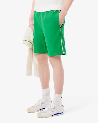 Shorts de felpa de algod&oacute;n con ribetes de marca