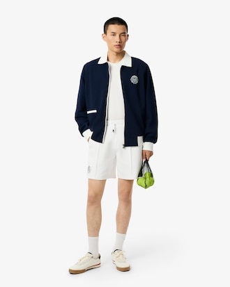 Shorts Heritage de tenis con detalles de insignia Ultra seco para hombre