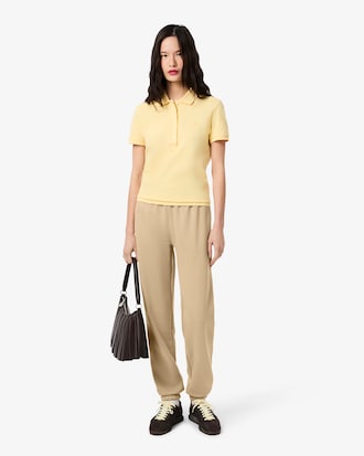 Pantalon molleton logo emboss&eacute;