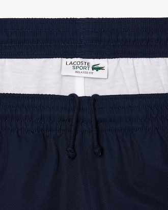 Shorts de tenis ligeros con rayas color block para hombre