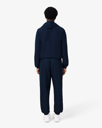 Pantalon de surv&ecirc;tement uni Lacoste SPORT en tissu l&eacute;ger