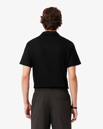 Polo Paris corte clásico cuello abierto bordado