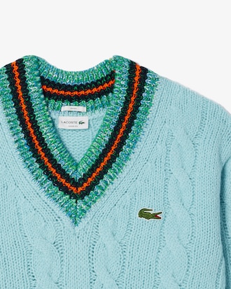 Su&eacute;ter holgado de lana con cuello en V y tejido de ochos