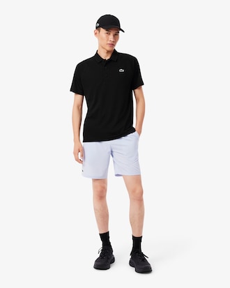 Polo homme Lacoste Sport en tissu r&eacute;sistant et respirant