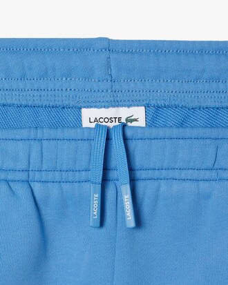 Short gar&ccedil;on avec inscription en molleton de coton biologique