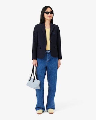 Playera sin mangas de algodón de corte ajustado para mujer