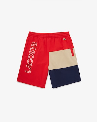 Bermudas de felpa con bloques de color con letras para hombre