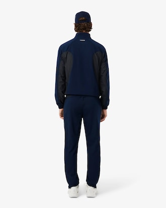 Conjunto de ch&aacute;ndal tenis repelente al agua