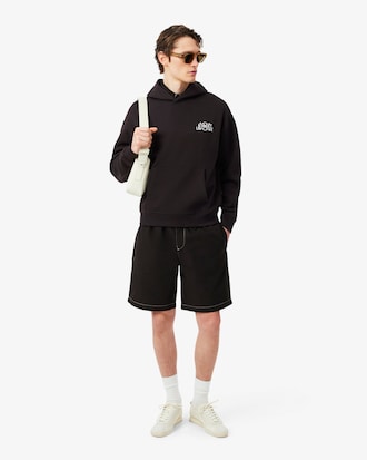 Sudadera de forro polar con m&uacute;ltiples estampados