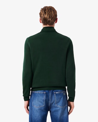 Pull zippé à col montant en coton biologique uni