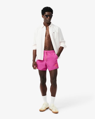 Traje de baño corto para hombre con detalles de insignia