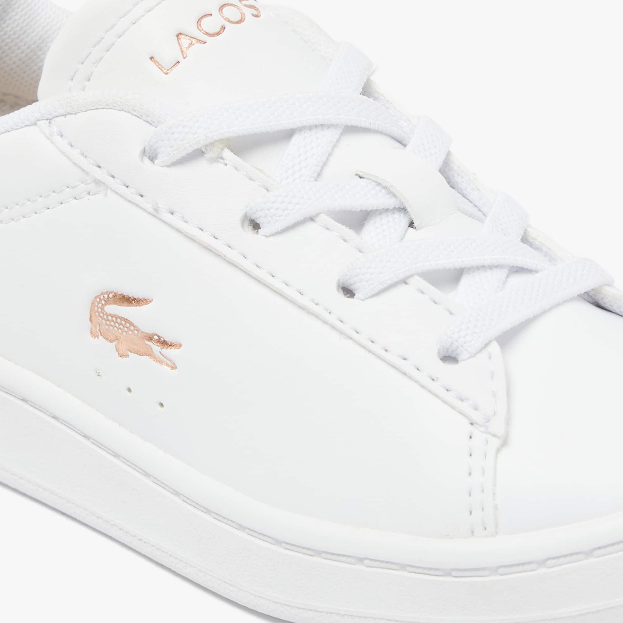 lacoste white and gold shoes