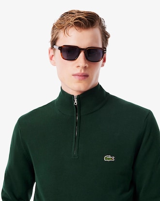 Pull zippé à col montant en coton biologique uni