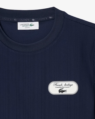 Playera de Tenis Cl&aacute;sica con Insignia Ultra Dry