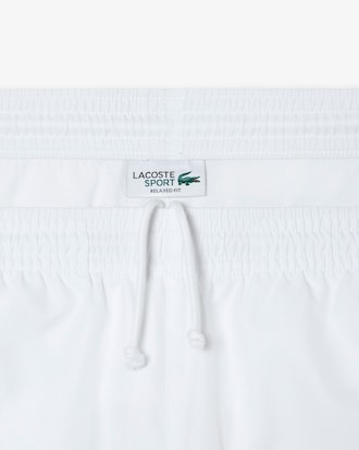 Shorts de tenis ligeros con rayas color block para hombre