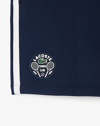 Shorts Heritage de tenis con detalles de insignia Ultra seco para hombre