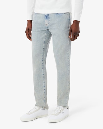 Jeans índigo de corte slim con cinco bolsillos para hombre