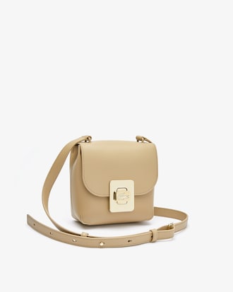 Sac &agrave; bandouli&egrave;re Amelia en cuir avec fermoir en m&eacute;tal grav&eacute;