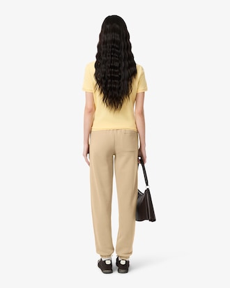 Pantalon molleton logo emboss&eacute;