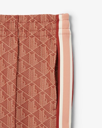 Pantalones deportivos acampanados con monograma para mujer