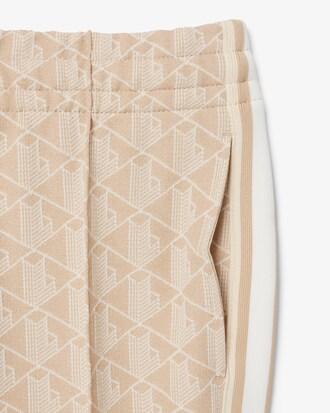 Pantalones deportivos acampanados con monograma para mujer