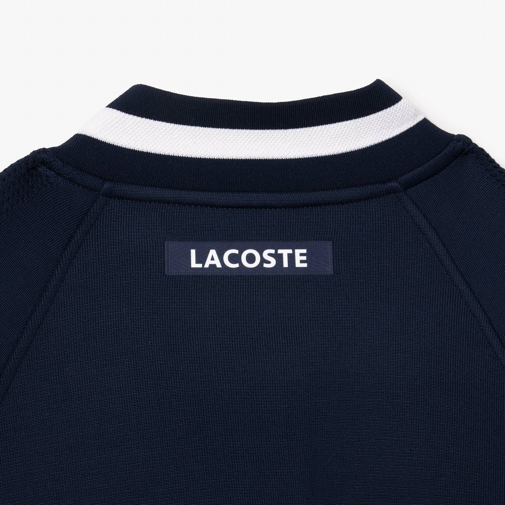 【完売品】CLUBHAUS LACOSTE LACOSTE (ラコステ) LACOSTE×NETFLIX 総柄プリント 半袖 ポロシャツ