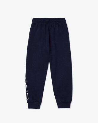 Pantal&oacute;n deportivo de felpa con letras para ni&ntilde;o