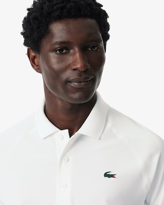 Polo homme Lacoste Sport en tissu r&eacute;sistant et respirant