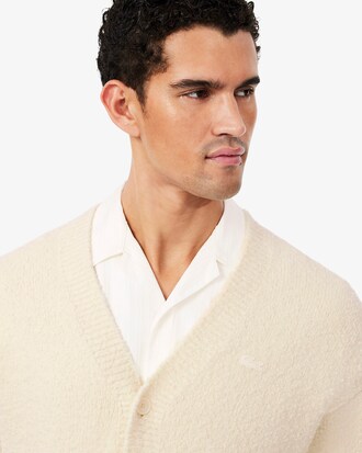Cardigan laine m&eacute;lang&eacute;e avec blason