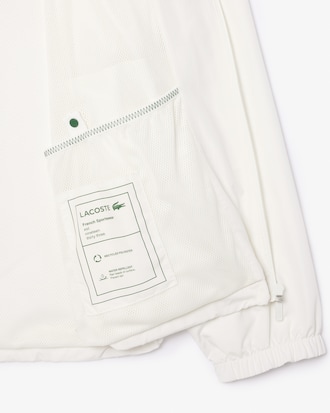 Chamarra corta resistente al agua con gorro desmontable