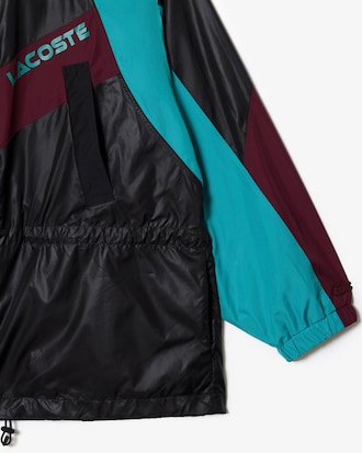 Chamarra oversized color block con gorro y cintura ajustable