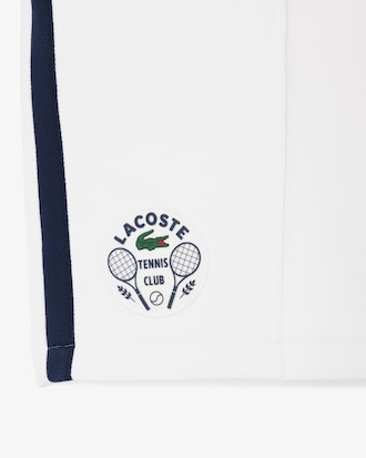 Shorts Heritage de tenis con detalles de insignia Ultra seco para hombre