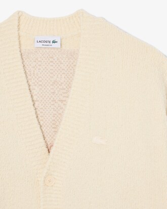 Cardigan laine m&eacute;lang&eacute;e avec blason