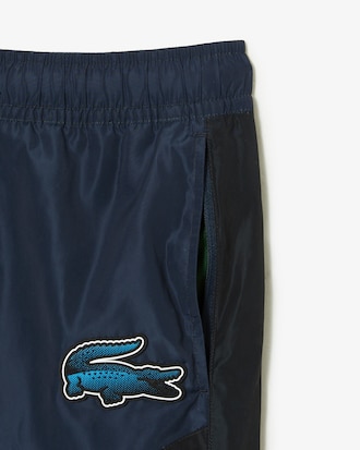 Pantal&oacute;n deportivo de hombre Lacoste con estampado de tablero