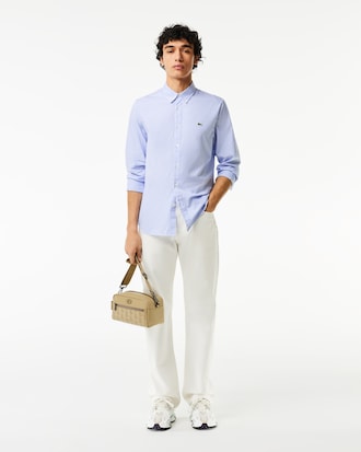 Monedero tipo bolsa con correa Nomogramme