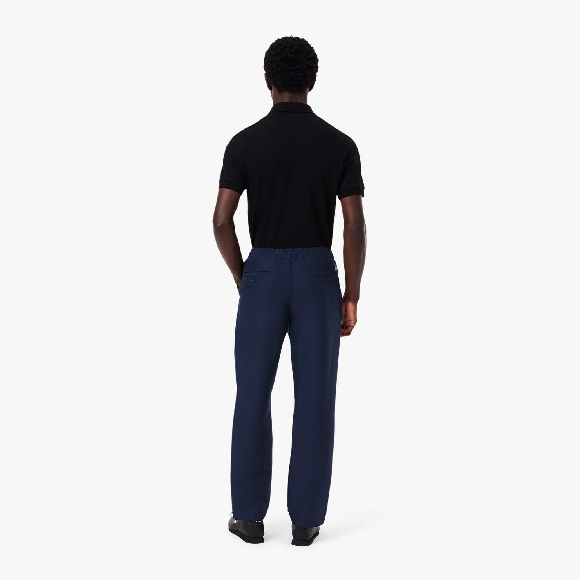 LACOSTE ネイビースラックス新品タグ付き - メルカリ