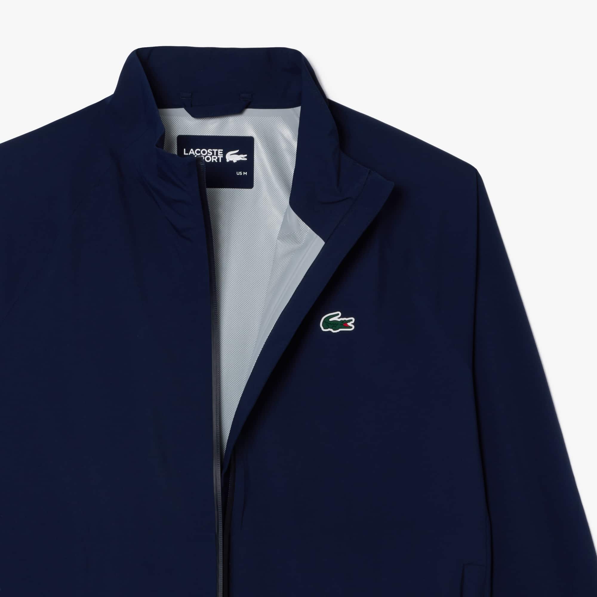 LACOSTE ネイビー ウィンドブレイカーパンツ Men's Water-Repellent Golf Stretch Windbreaker - Jackets & Coats