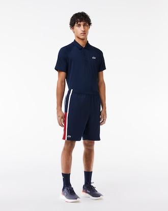 Shorts de tenis ligeros con rayas color block para hombre