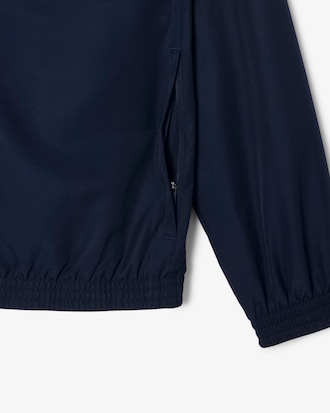 Conjunto deportivo de tenis con franjas con logo