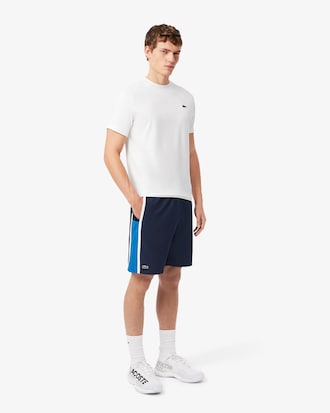 Shorts de tenis ligeros con rayas color block para hombre