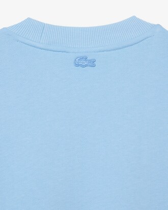 Sudadera estampada de algod&oacute;n org&aacute;nico de Lacoste x Netflix