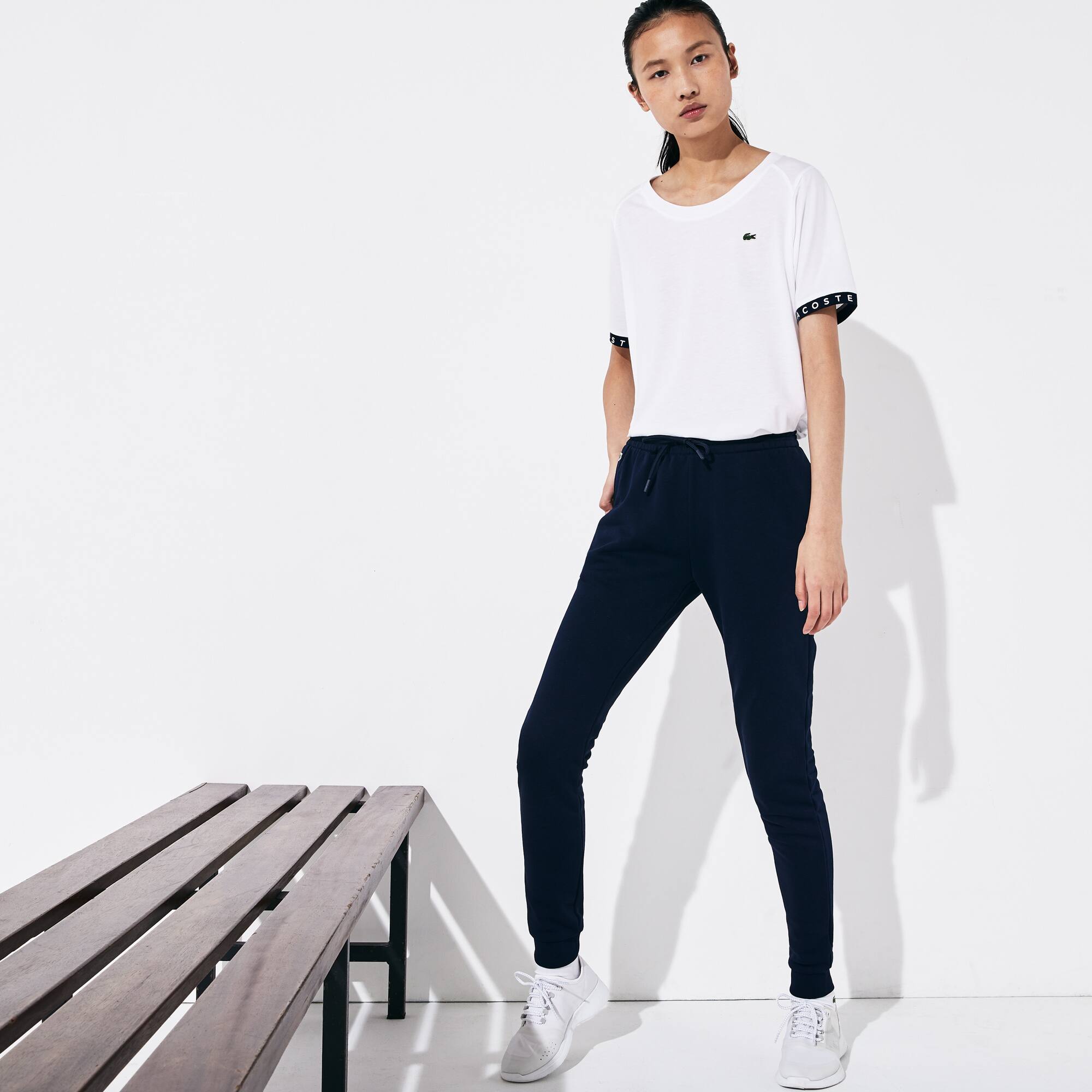 white lacoste track pants