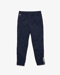Pantal&oacute;n deportivo Lacoste SPORT ligero con ribetes para ni&ntilde;o