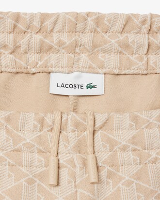 Pantalones deportivos acampanados con monograma para mujer