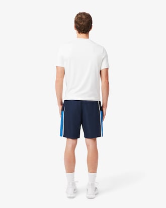 Shorts de tenis ligeros con rayas color block para hombre