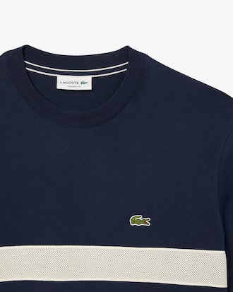 Playera de punto grueso con bandas de malla